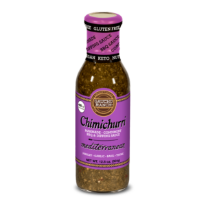 Bottle of Gaucho Ranch Chimichurri marinade, labeled as a condiment for BBQ and dipping sauce, featuring ingredients like parsley, garlic, basil, and thyme